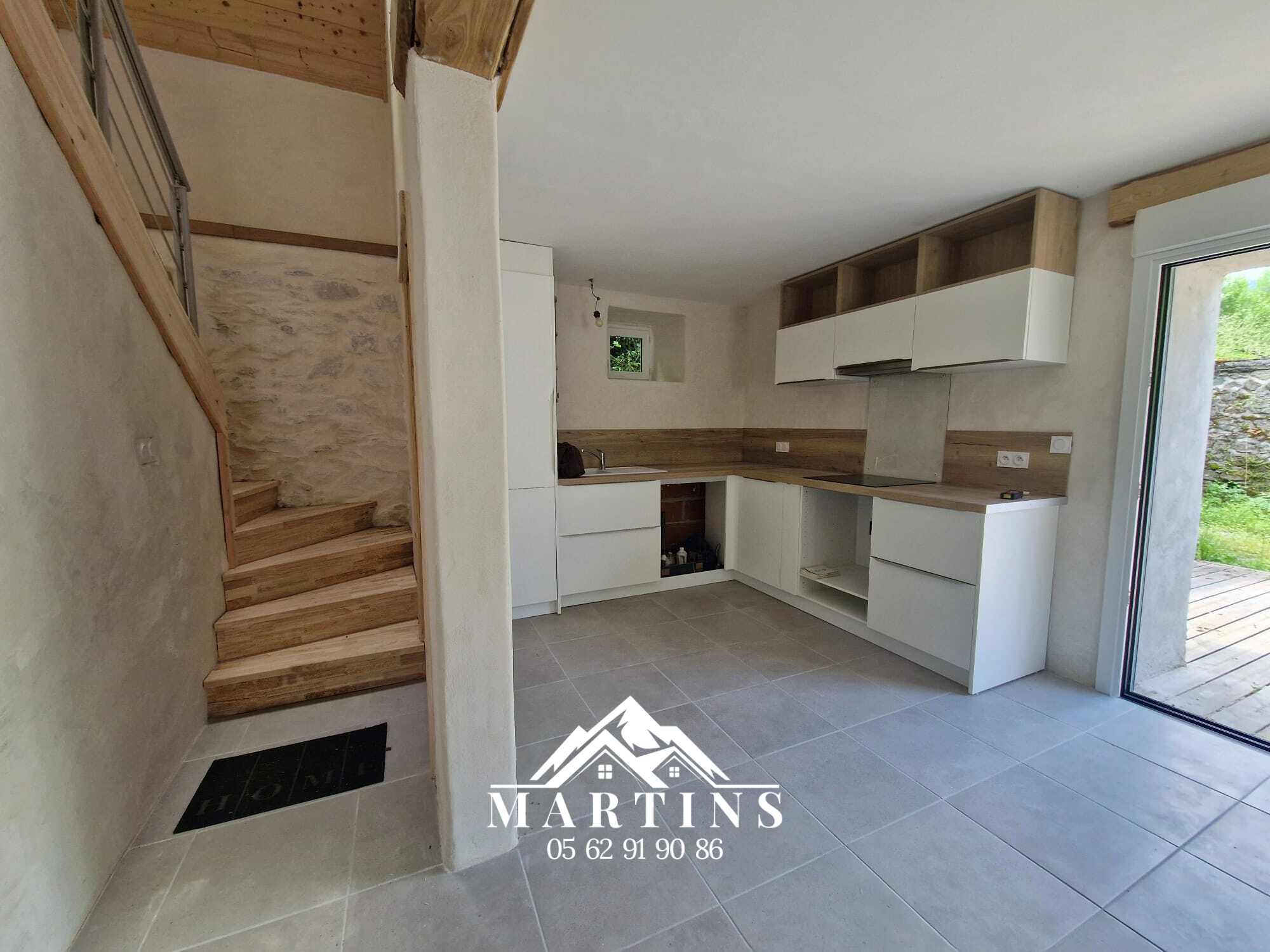 ARBEOST - Maison de village, double garage et jardin.